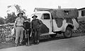 065 1942 - Tom Beazley (right) with mate Jake (left) and local inhabitant outside the NZ Hospital in B.jpg