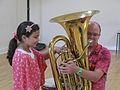 A young carer explores musical instruments.jpg