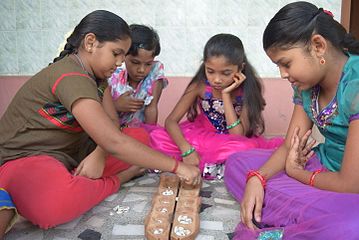 Kids playing Pallanguli.JPG