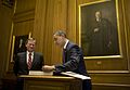 President-elect Barack Obama signs a guest book as Chief Justice John Roberts Jr. looks on during a visit to the U.S. Supreme Court in Washington, D.C. on Weds. Jan. 14, 2009.jpg